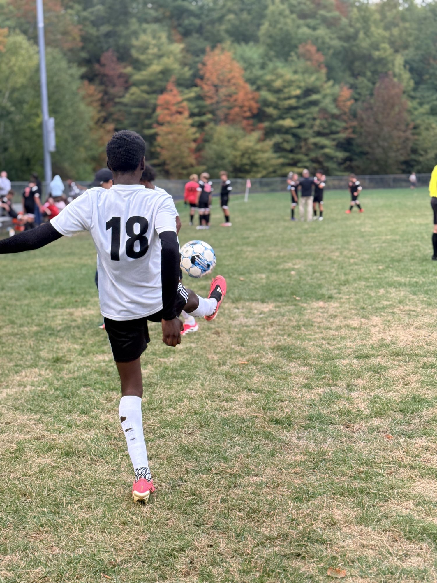 Pine Tree Academy No. 18 striking the ball during the 6-0 road win at Wiscasset/Boothbay on September 29, 2026