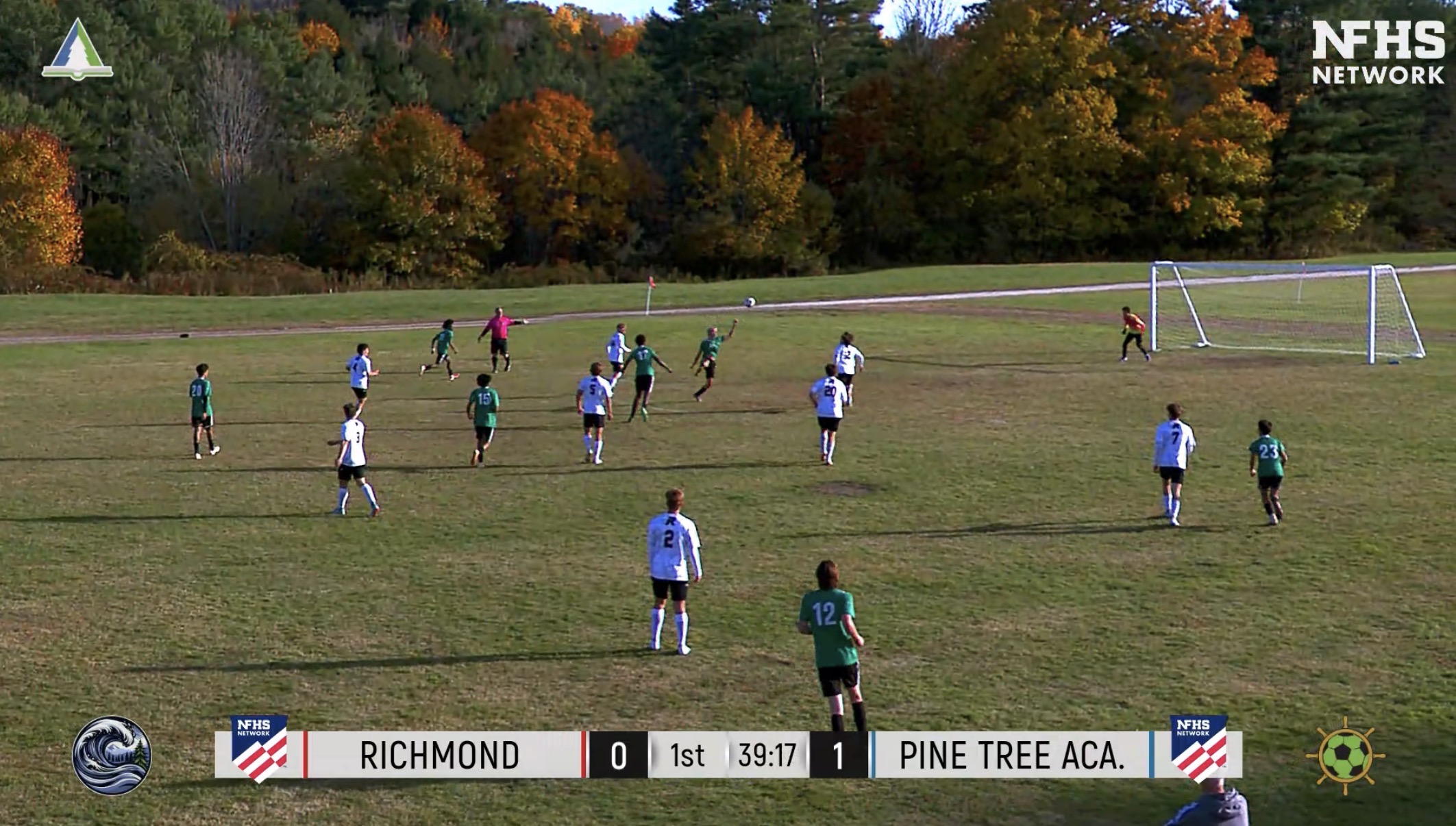 Authentic NFHS frame from PTA's October 22 Richmond scrimmage, with the full original scoreboard showing Richmond 0, Pine Tree Academy 1 at an earlier moment, and original PTA and NFHS logos.