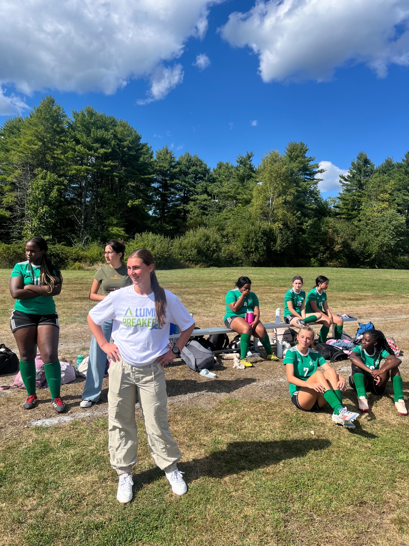 Pine Tree Academy girls varsity soccer players and coaching staff on the sideline during the 2-0 win over Vinalhaven on September 19, 2026