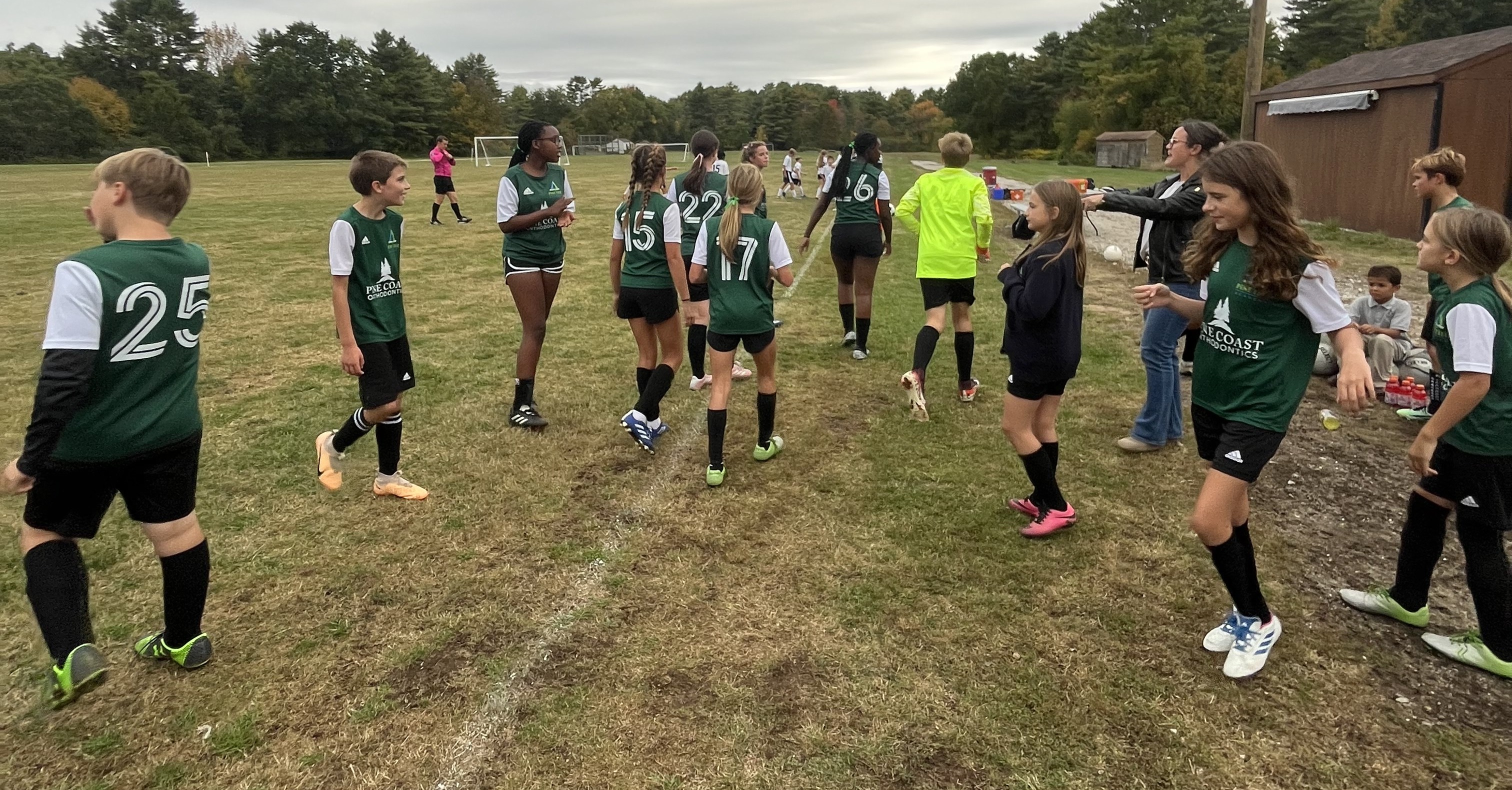 Pine Tree Academy middle school soccer players gather on the field during the 5–4 comeback win over Greater Portland Christian School on September 29, 2026