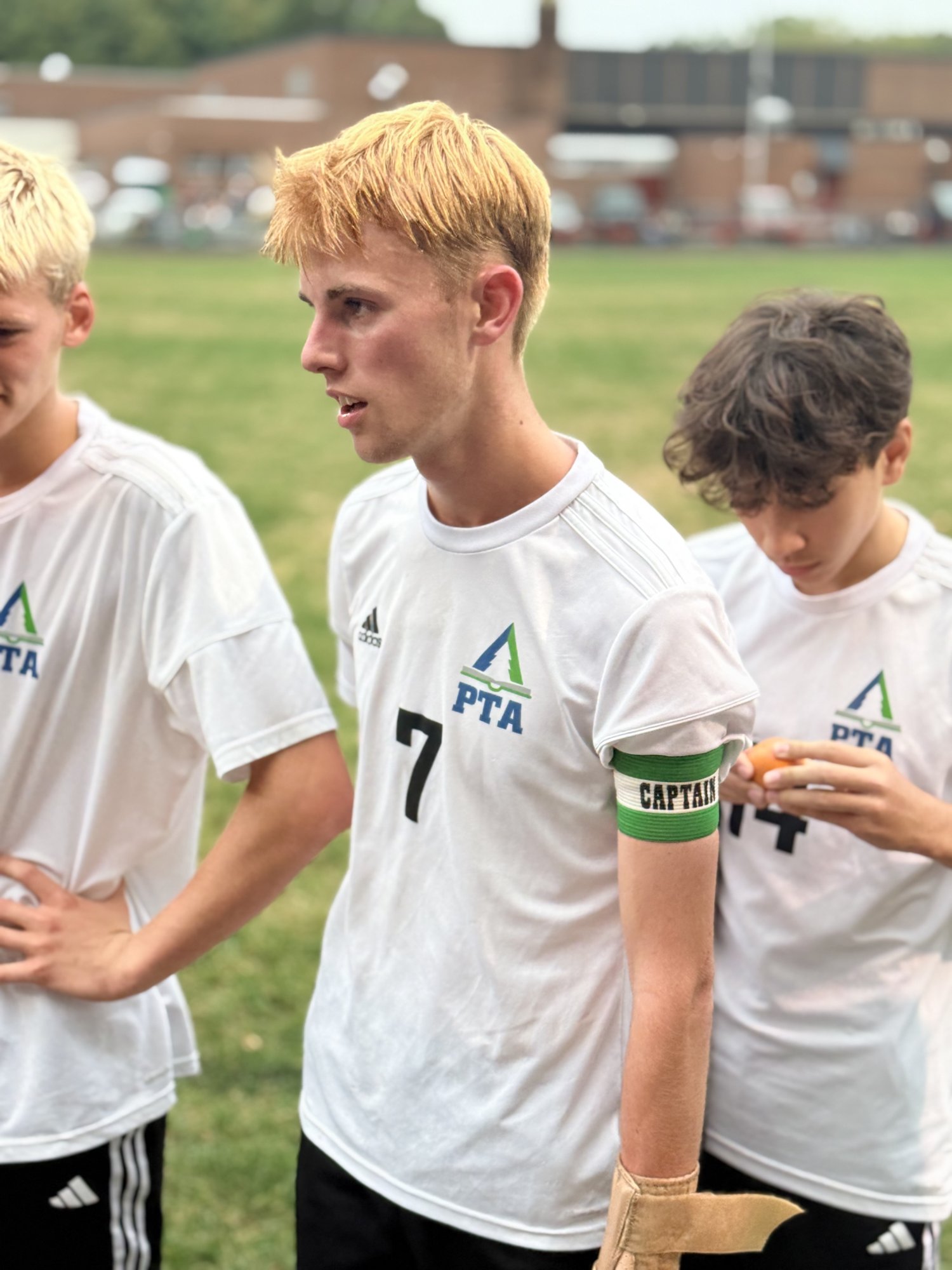 Pine Tree Academy captain No. 7 talking with teammates during the 6-0 road win at Wiscasset/Boothbay on September 29, 2026