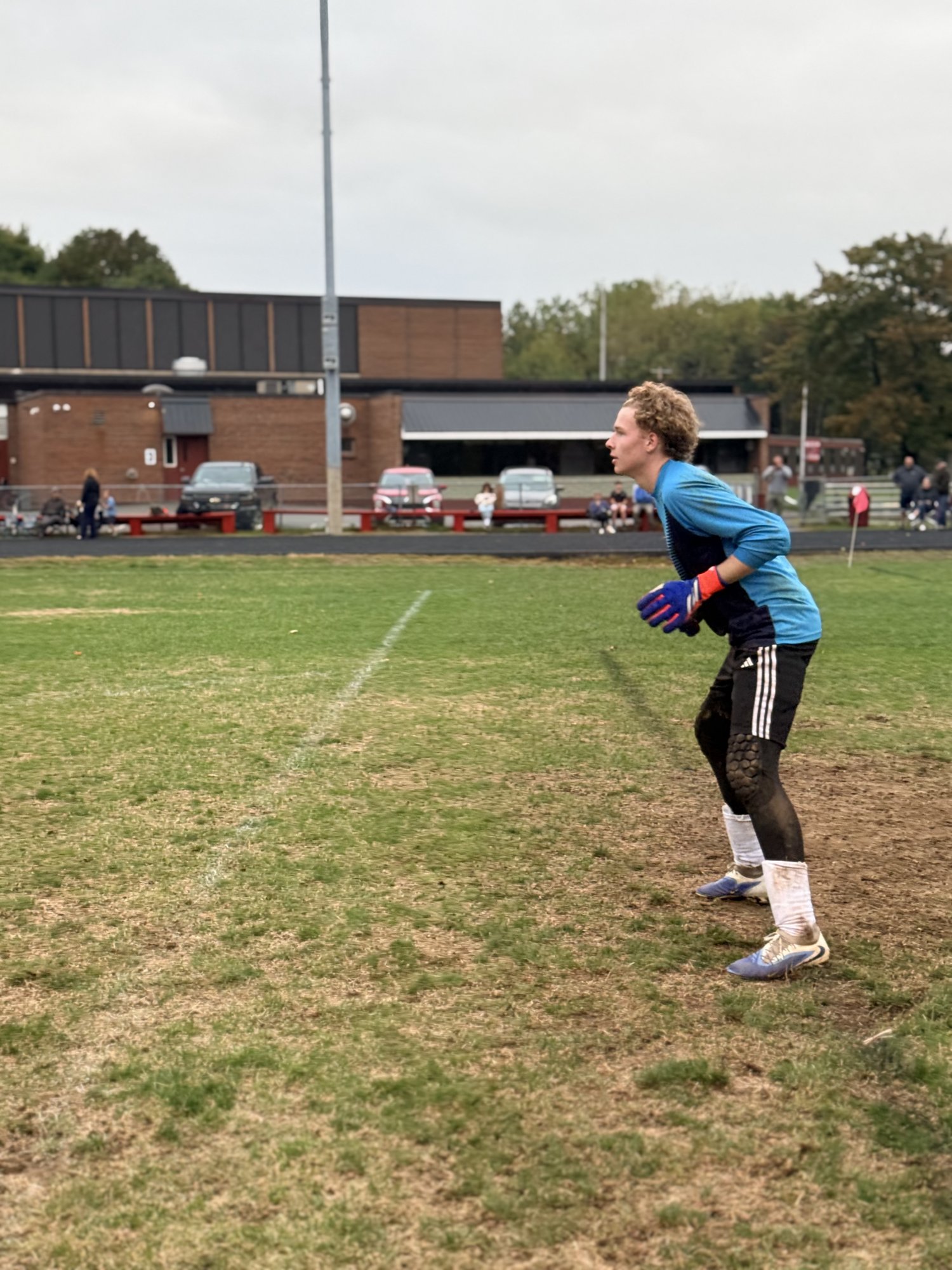 Pine Tree Academy goalkeeper set in his crouch during the 6-0 road win at Wiscasset/Boothbay on September 29, 2026